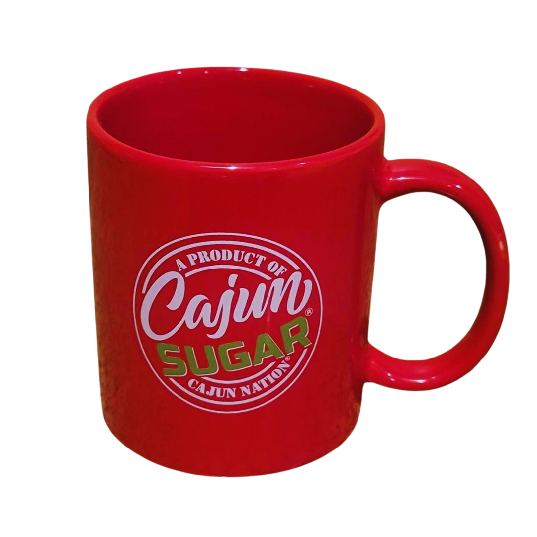 Cajun  Nation Cajun Sugar Red Coffee Mug is perfect for coffee, tea and hot chocolate, this classic shape red, durable ceramic mug comes in the most popular sizes - 11 oz. High quality sublimation printing on both sides makes it an appreciated gift to every true hot beverage lover. Red Ceramic 11 ounces,  (0.33 l) Rounded corners C-handle Cajun Sugar brand on both sides.